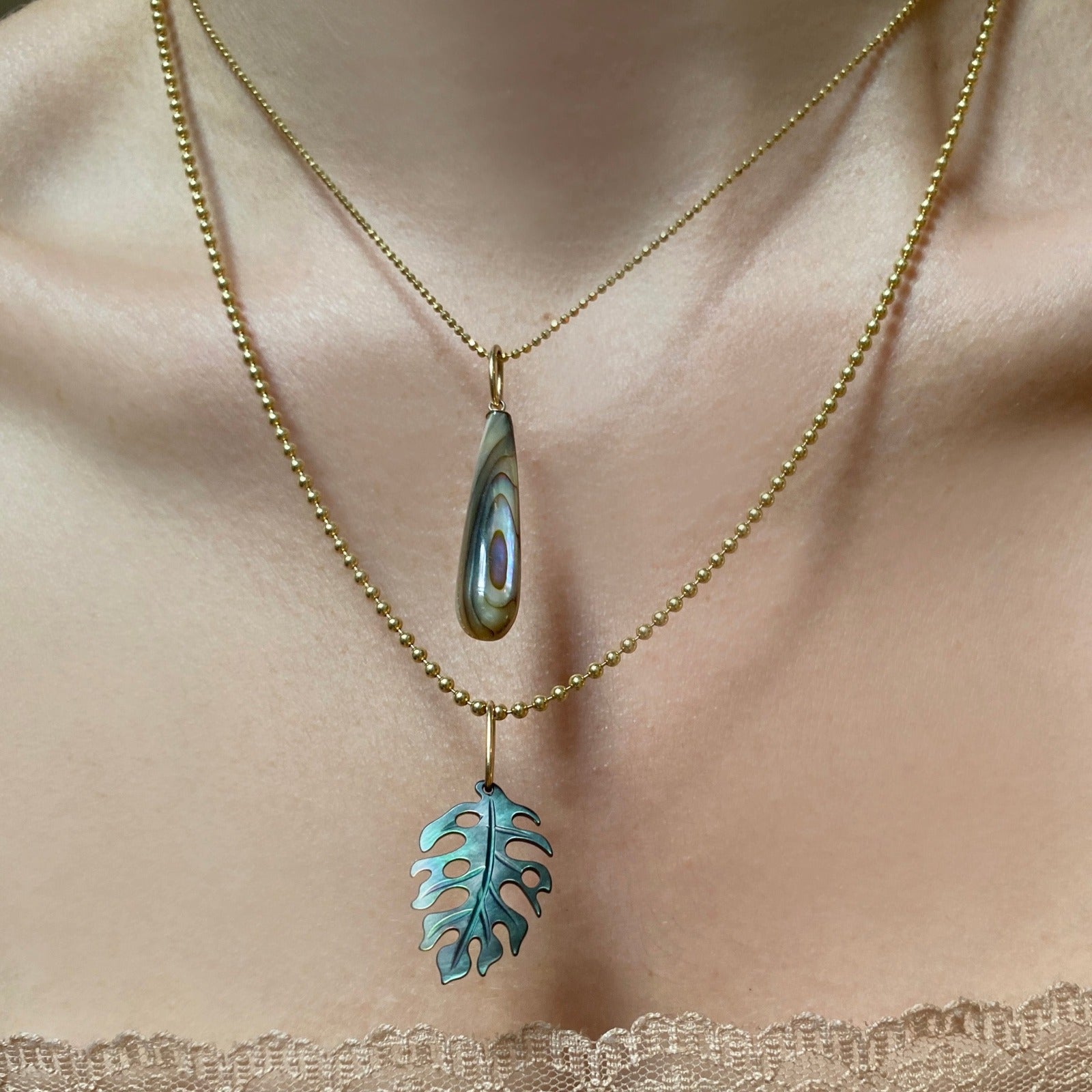 Paua Teardrop Charm styled on a diamond cut bead chain